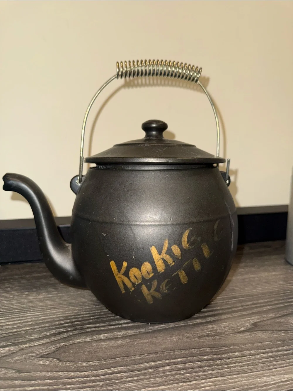 McCoy Pottery Kookie Kettle cookie jar crafted from black ceramic